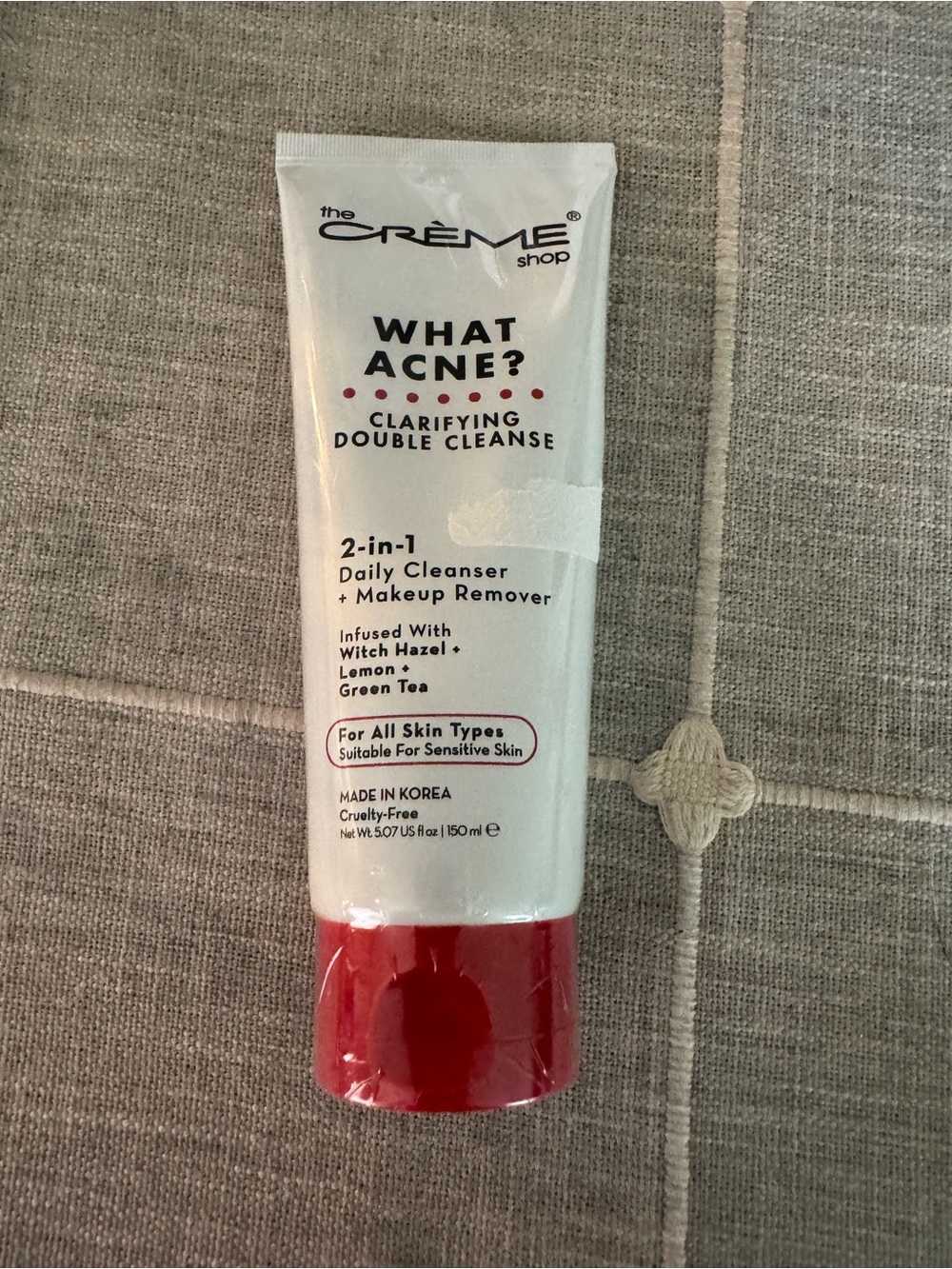 The Crème Shop What Acne? Clarifying Cleanser — White Tube with Red Cap